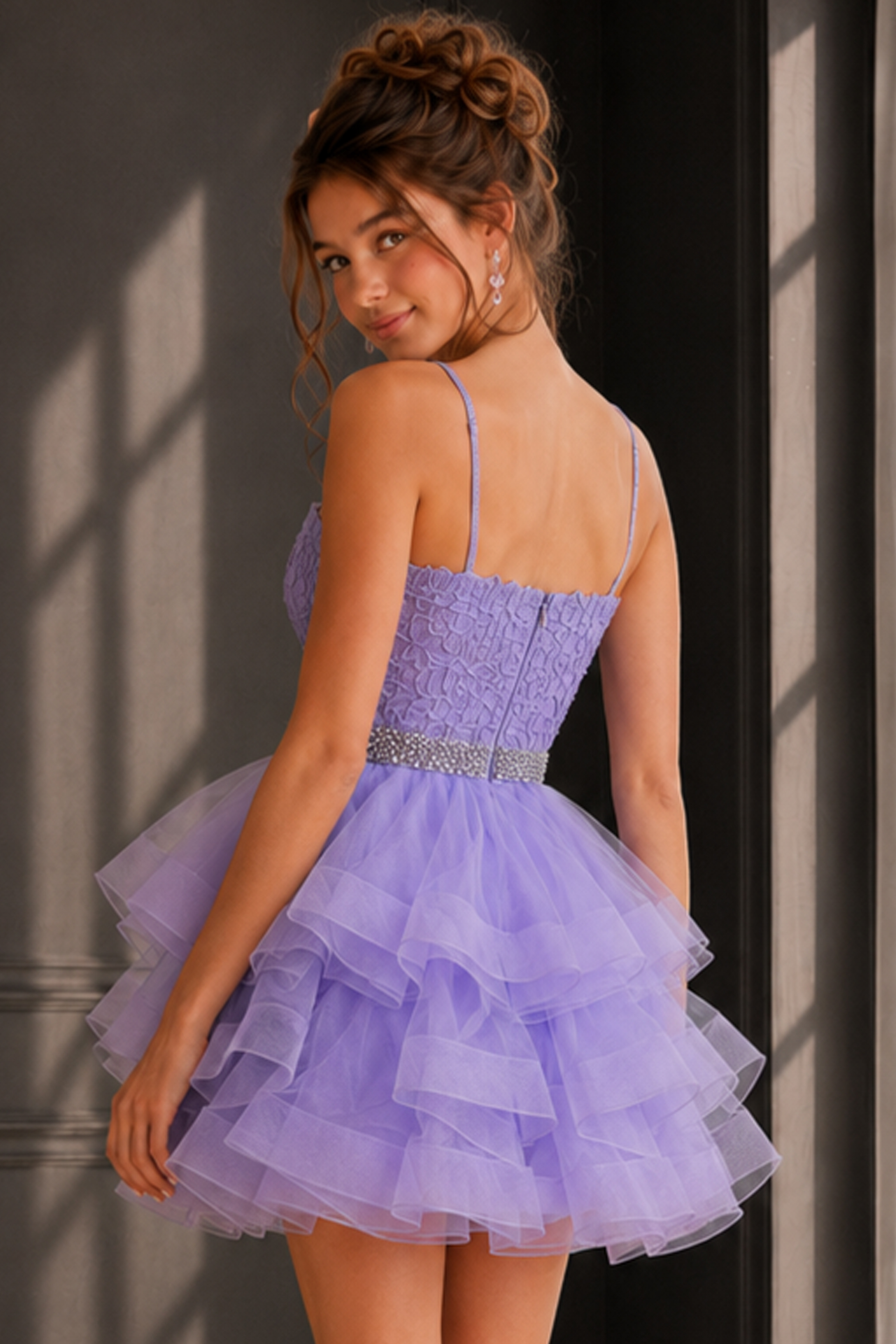 back view of lilac ruffle dress with lace bodice and beaded belt