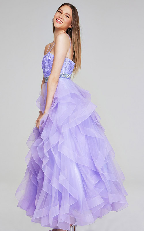 Jovani K23519 lilac gown with ruffled tulle skirt, side view.