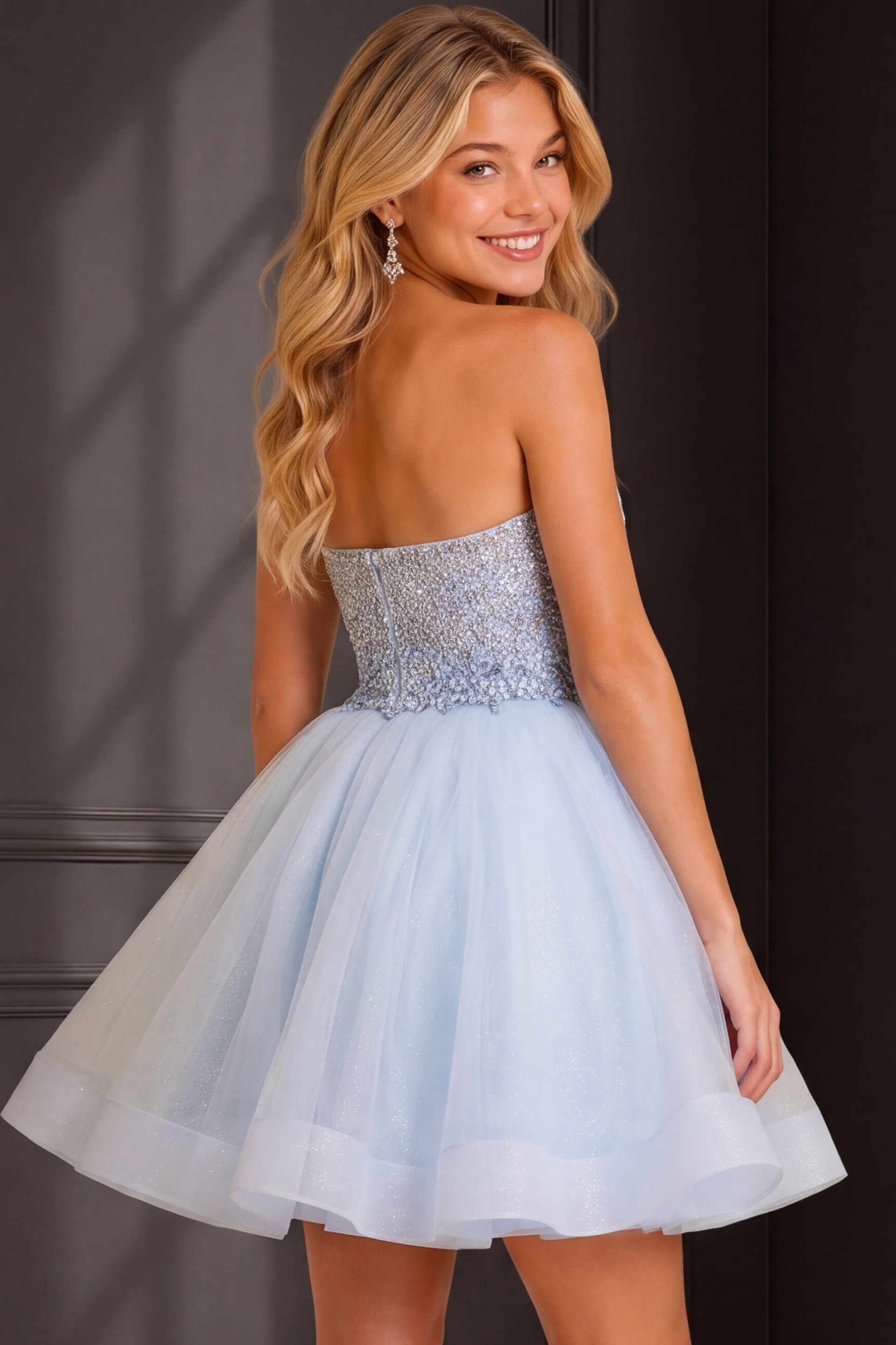 back view of light blue dress with beaded bodice and tiered tulle skirt