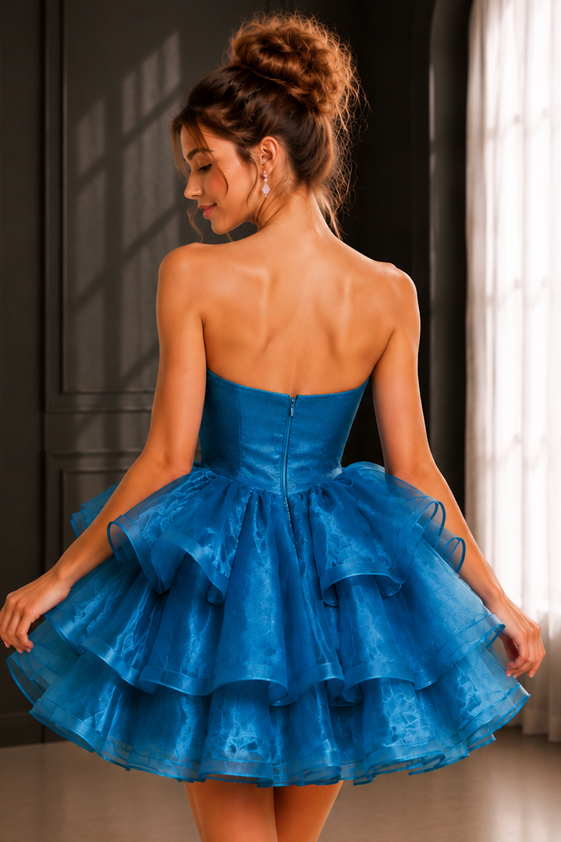 back view of blue ruffle dress with strapless bodice and zip back