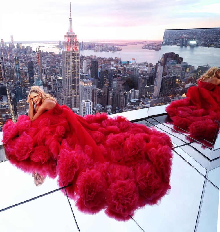 Red carpet ball gown Jovani style #42781 worn by Miss Universe at Summit One Vanderbilt